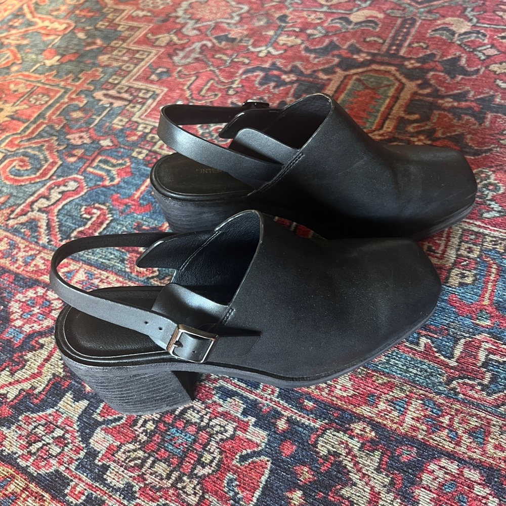 INTENTIONALLY BLANK Black Mules with Slingback